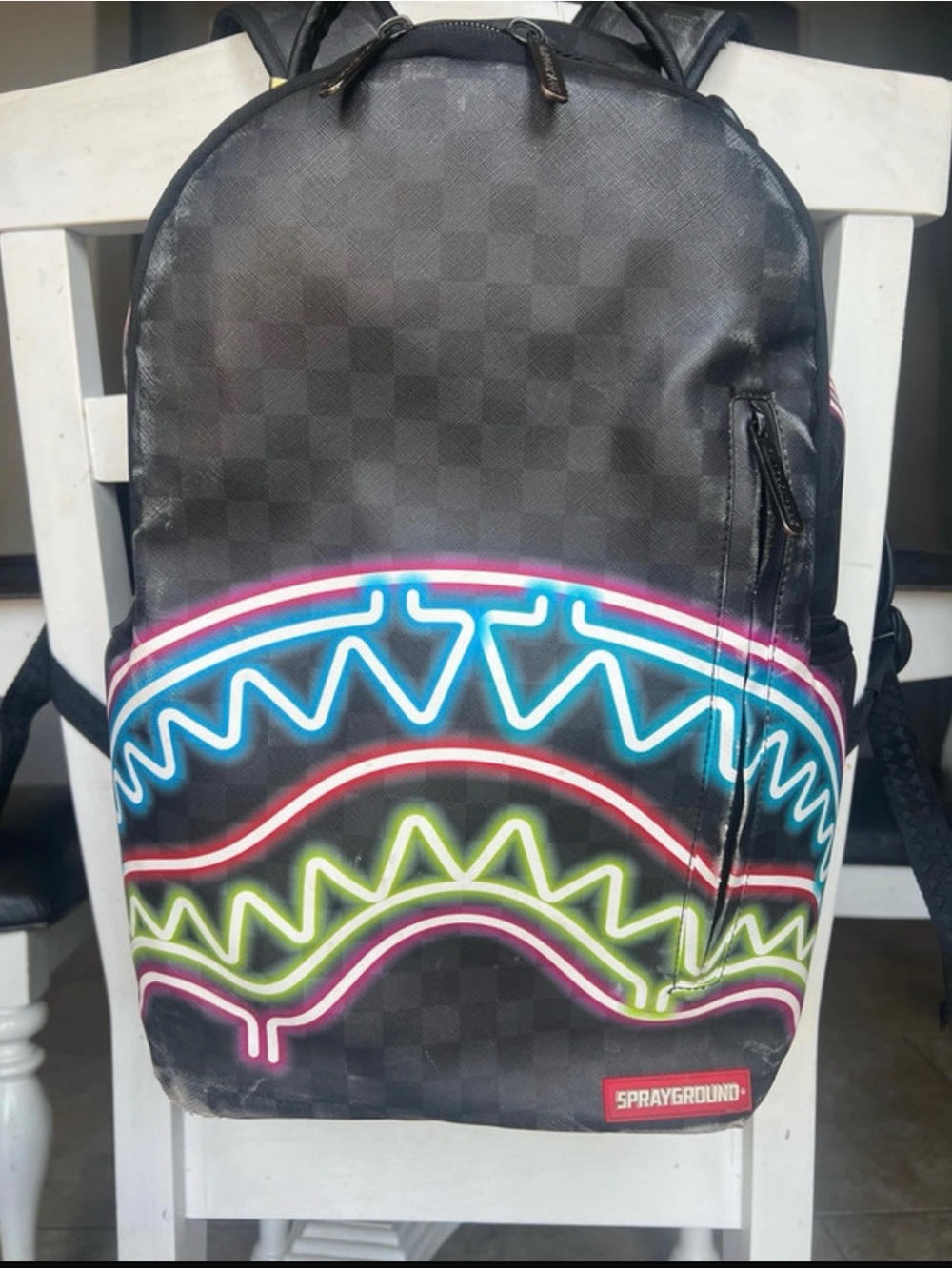 🔥 Sprayground backpack with bold neon wave design! 🔥